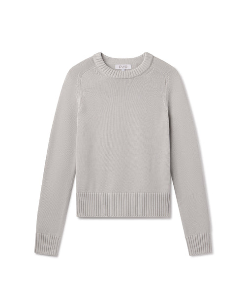 Light grey long-sleeve crewneck cotton-silk blend sweater laid flat on white background