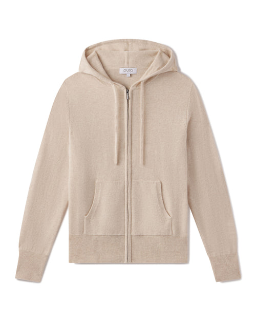 Beige oatmeal zip-up cashmere hoodie with front pockets and drawstring hood, laid flat on white background