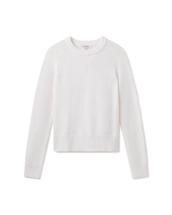 White crewneck long-sleeve cotton-silk blend sweater laid flat on white background