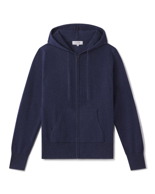 Clothing product photo: Indigo blue zip-up cashmere hoodie with front pockets and drawstring hood, laid flat on white