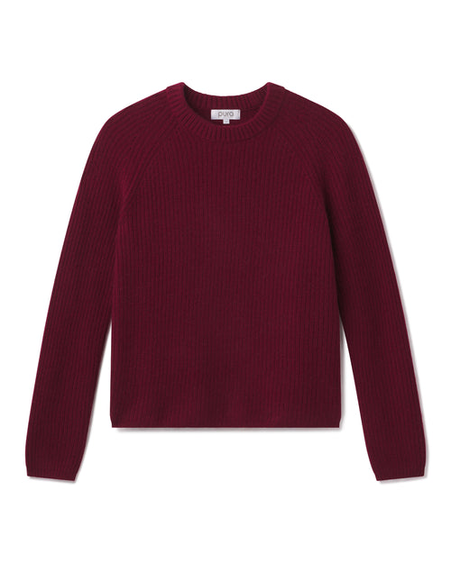 Maroon long-sleeve crewneck cashmere sweater laid flat on white background