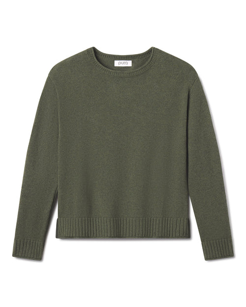 Cashmere crew neck sweater in olive green with ribbed cuffs and hem, laid flat on white background
