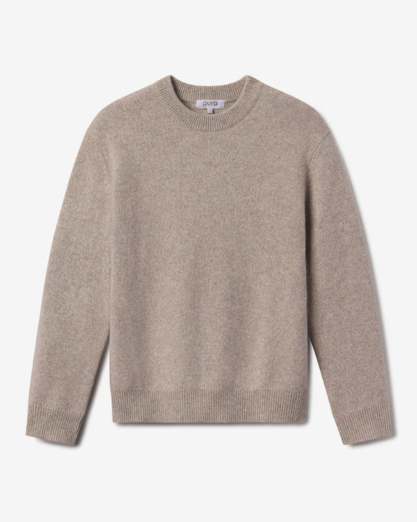 Men's beige crew neck cashmere sweater laid flat, long sleeves, ribbed cuffs and hem, plain knit texture