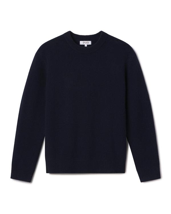 Men's navy blue crew neck cashmere sweater laid flat on white background