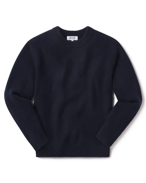 Men's navy blue crewneck cashmere sweater laid flat on white background