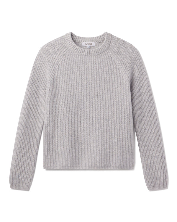 Light grey ribbed crewneck cashmere sweater with long sleeves, laid flat on white background