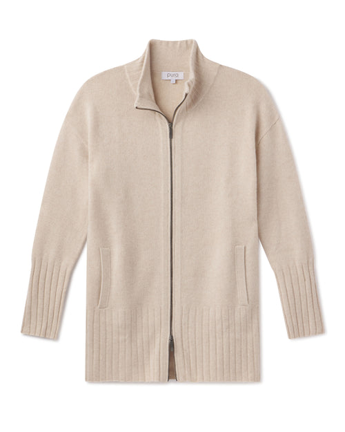 Cashmere zip-up cardigan in oatmeal color with ribbed cuffs and hem, front pockets, and stand collar
