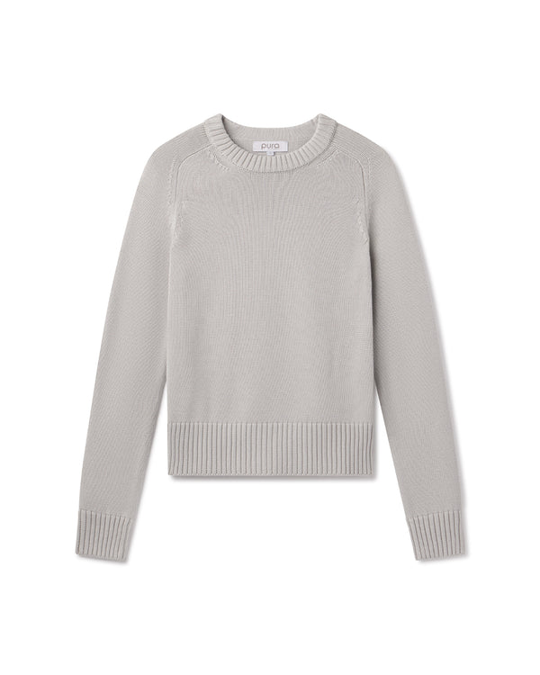 Light grey long-sleeve crewneck cotton-silk blend sweater laid flat on white background