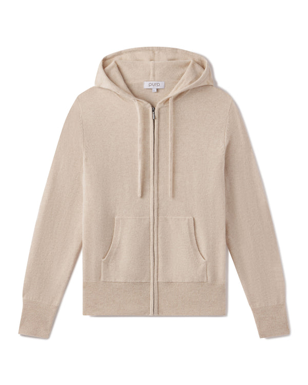 Beige oatmeal zip-up cashmere hoodie with front pockets and drawstring hood, laid flat on white background