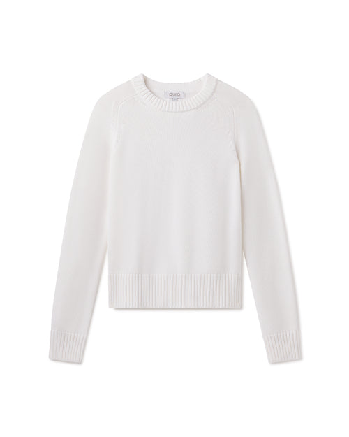 White crewneck long-sleeve cotton-silk blend sweater laid flat on white background