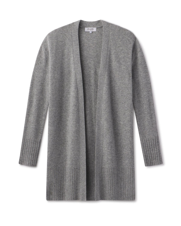 LIFESTYLE / EDITORIAL: Long grey open-front cashmere cardigan with ribbed cuffs and hem, displayed flat against white