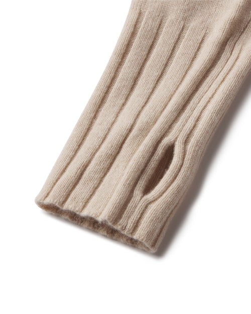 Close-up of oatmeal-colored ribbed cashmere sleeve with thumb hole detail