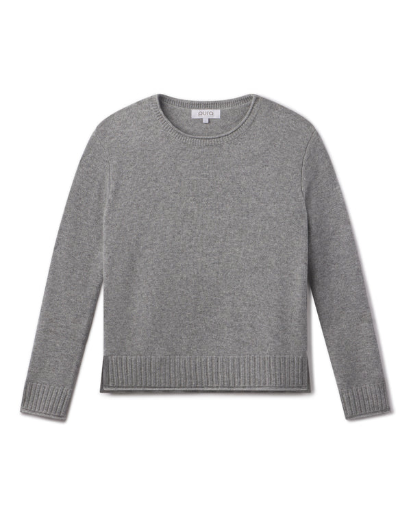 Cashmere crewneck sweater in stone gray with ribbed cuffs and hem, laid flat on white background