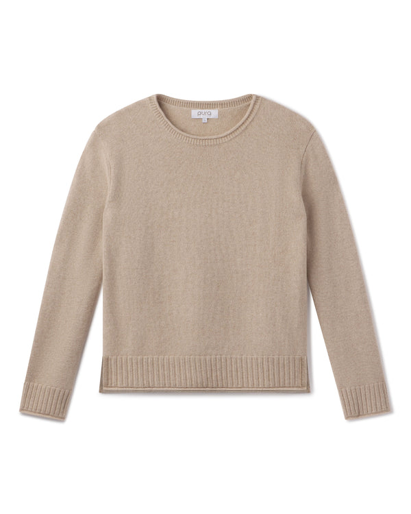 Beige cashmere crewneck sweater with ribbed cuffs and hem, laid flat on white background