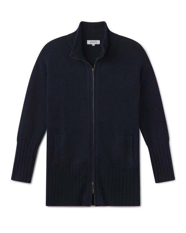 CASHMERE GARMENT: Navy blue zip-up cardigan with ribbed cuffs and hem, front pockets, and stand collar