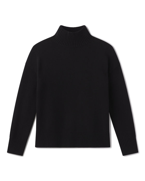Black cashmere funnel neck sweater laid flat, showing the ribbed collar, cuffs and hem