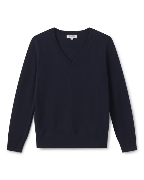 Navy blue V-neck cashmere sweater with long sleeves, laid flat on white background
