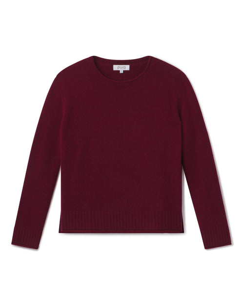 Cashmere crewneck sweater in barolo color, long sleeves, ribbed cuffs and hem, flat lay on white background