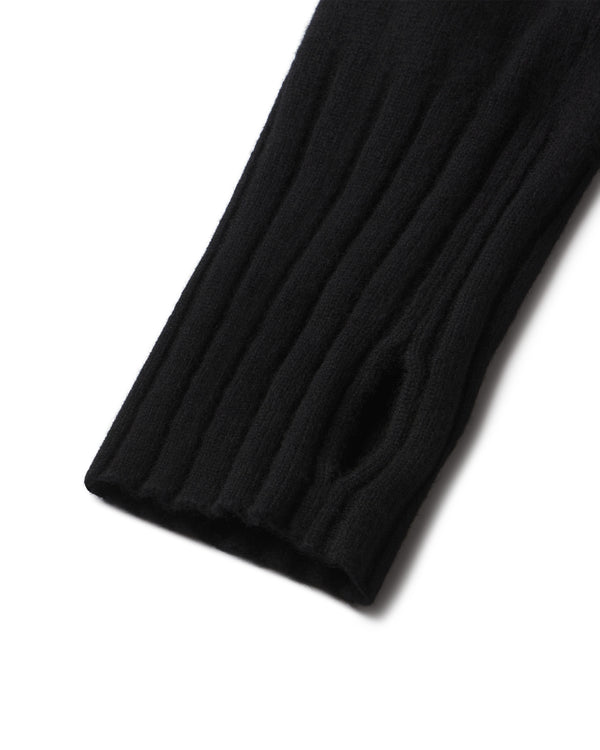 Close-up of black ribbed cashmere sleeve with thumb hole detail