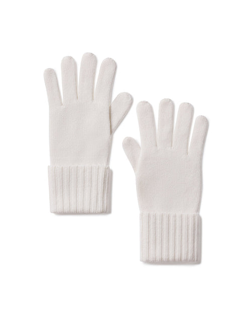 Pair of ivory cashmere gloves with ribbed cuffs laid flat on white background
